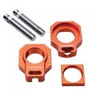 Rab19-orange Tusk Racing Axle Block