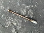 1974 Suzuki Front Wheel Axle + Nut. Fixed Price $18.85.