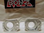 Suzuki 2000-2008 Rear Wheel Axle Blocks RM125 Chain Adjuster. Fixed Price $34.95.