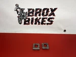 1993 Honda CR250R Rear Wheel Axle Block Chain Pullers. Fixed Price $20.00.