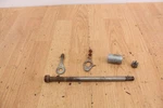 1971 Yamaha HT1 Rear Axle W/ Spacer And Adjusters. Fixed Price $25.00.