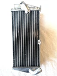 2016 Left Side Radiator Mxpuk Performance (R063B). Fixed Price $53.64.