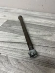 1979 Yamaha DT250F Oem Front Axle And Castle Nut. Fixed Price $24.99.