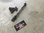 06-08 Kawasaki Ninja EX650 Rear Axle With Caliper Bracket. Fixed Price $22.00.