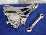 Fits Harley, Dna Paughco Springer Front End Chrome Left Brake Caliper Kit. Fixed Price $299.00.