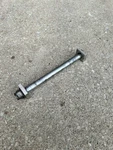 00-24 DRZ400SM Rear Axle, Castle Nut Washer And Adjustment Blocks Good Condition. Fixed Price $90.00.