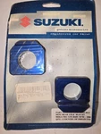 New Oem Suzuki 990A0-65002-BLU Blue Rear Axle Block Kit Nos. Fixed Price $29.99.
