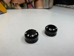 Harley Covington Rear Dimpled Black Axle Covers. Fixed Price $59.95.