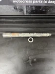 2001 - 2007 Suzuki RM250 Oem Front Wheel Axle Bolt Mount. Fixed Price $22.00.