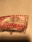 Kawasaki Rear Axle Collar P/n 42032-042 L=22MM 1973 F12MX 1974 KX450 Nos. Fixed Price $15.00.