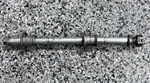 Suzuki RM85 Front Axle Bolt 54711-03B00 2002-2023 Used Oe. Fixed Price $30.00.