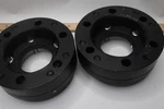 (2-PK) Vlaoschi Forged Wheel Adapters Black 2" Scratched/chipped Paint. Fixed Price $49.00.